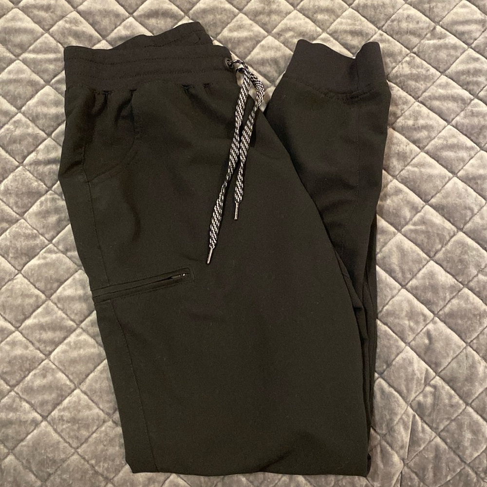 NWT, brand new Jaanuu women’s black jogger style medical scrub bottoms unopened